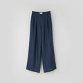 The Trouser in petrol linen, shown against a plain background